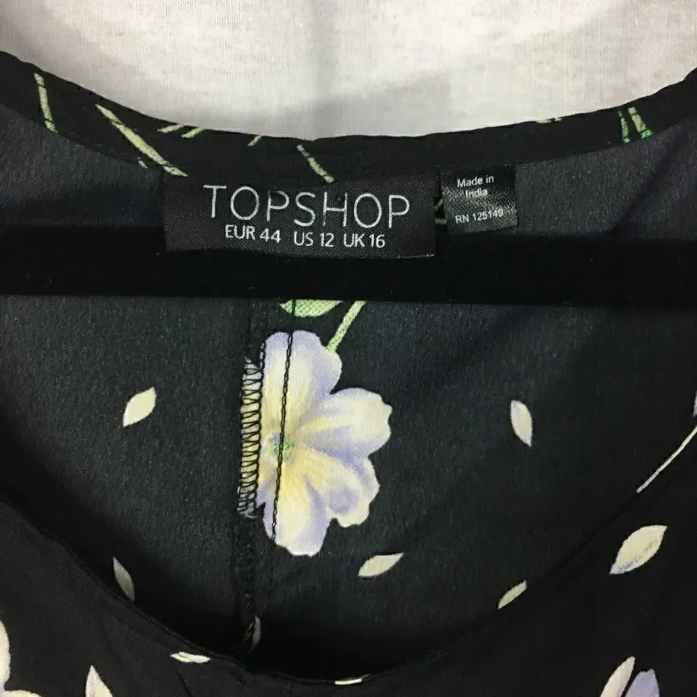 Top shop black white floral size 12 romper button closure on sleeves
